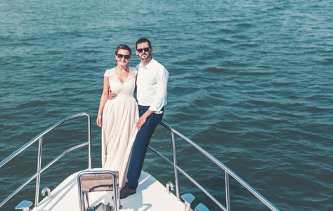 Wedding Party Toasting on Private Yacht with Jacksonville Views